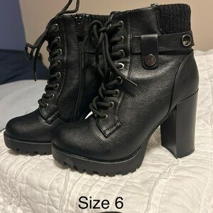 Black Doc Martens inspired boots with heel